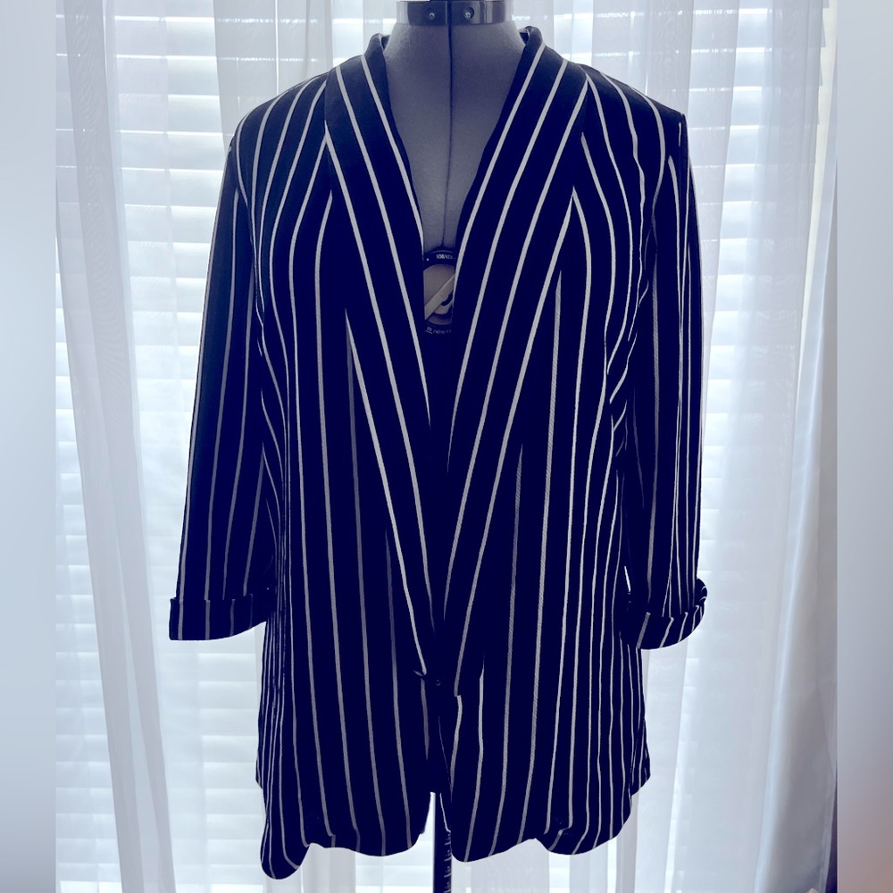 Black collared blazer jacket with white stripes.